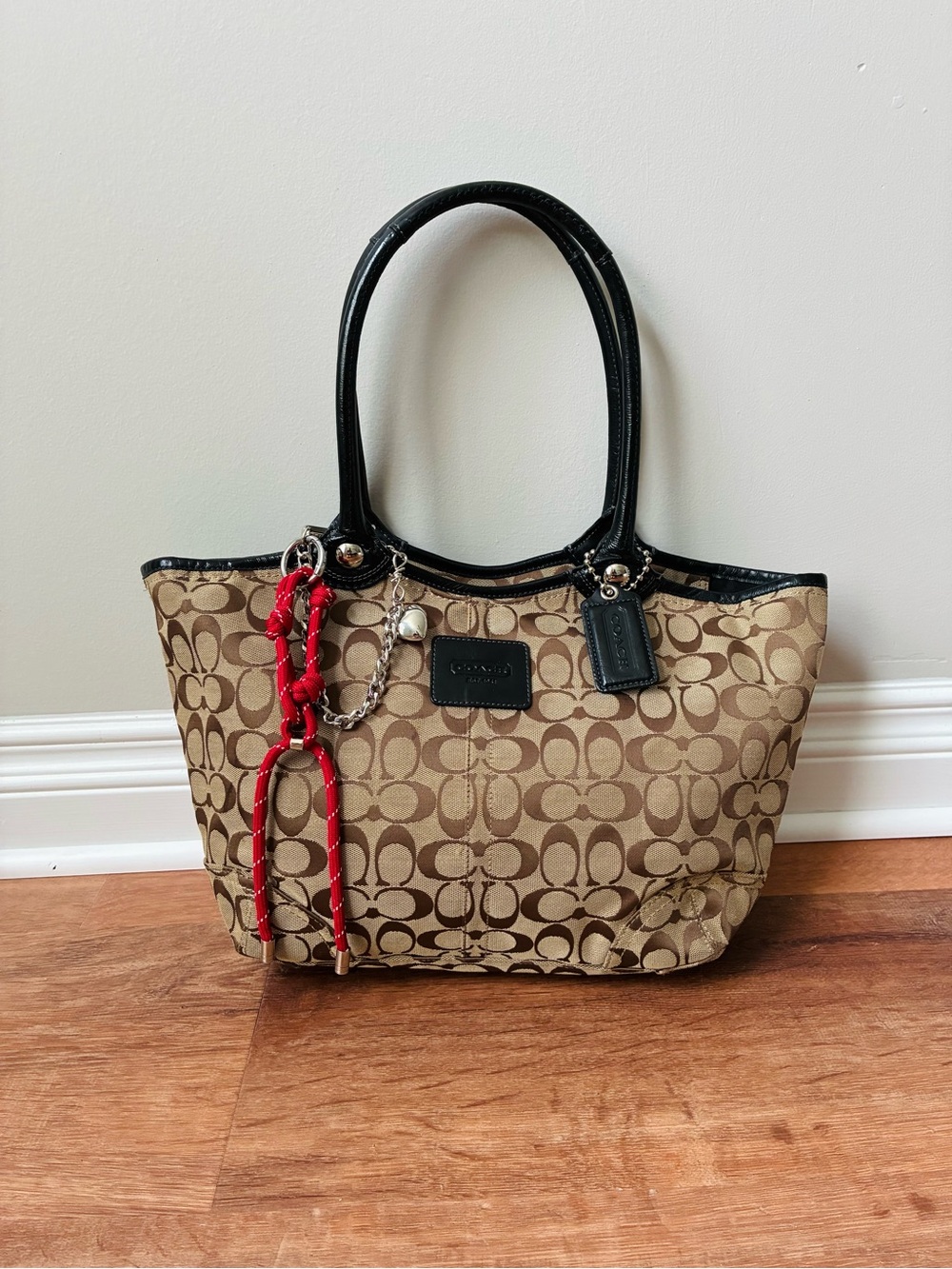 Coach Bleaker Signature Canvas Tote with Black Trim and Red Charm